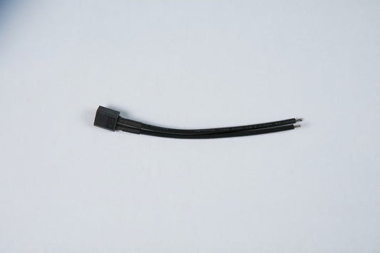 black wire connector on a white background