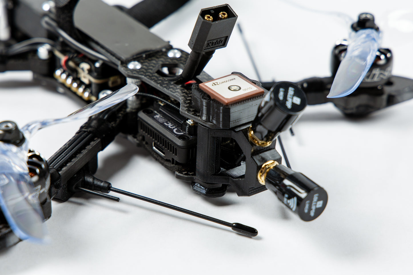 photo of fpv drone from the back close up with white background