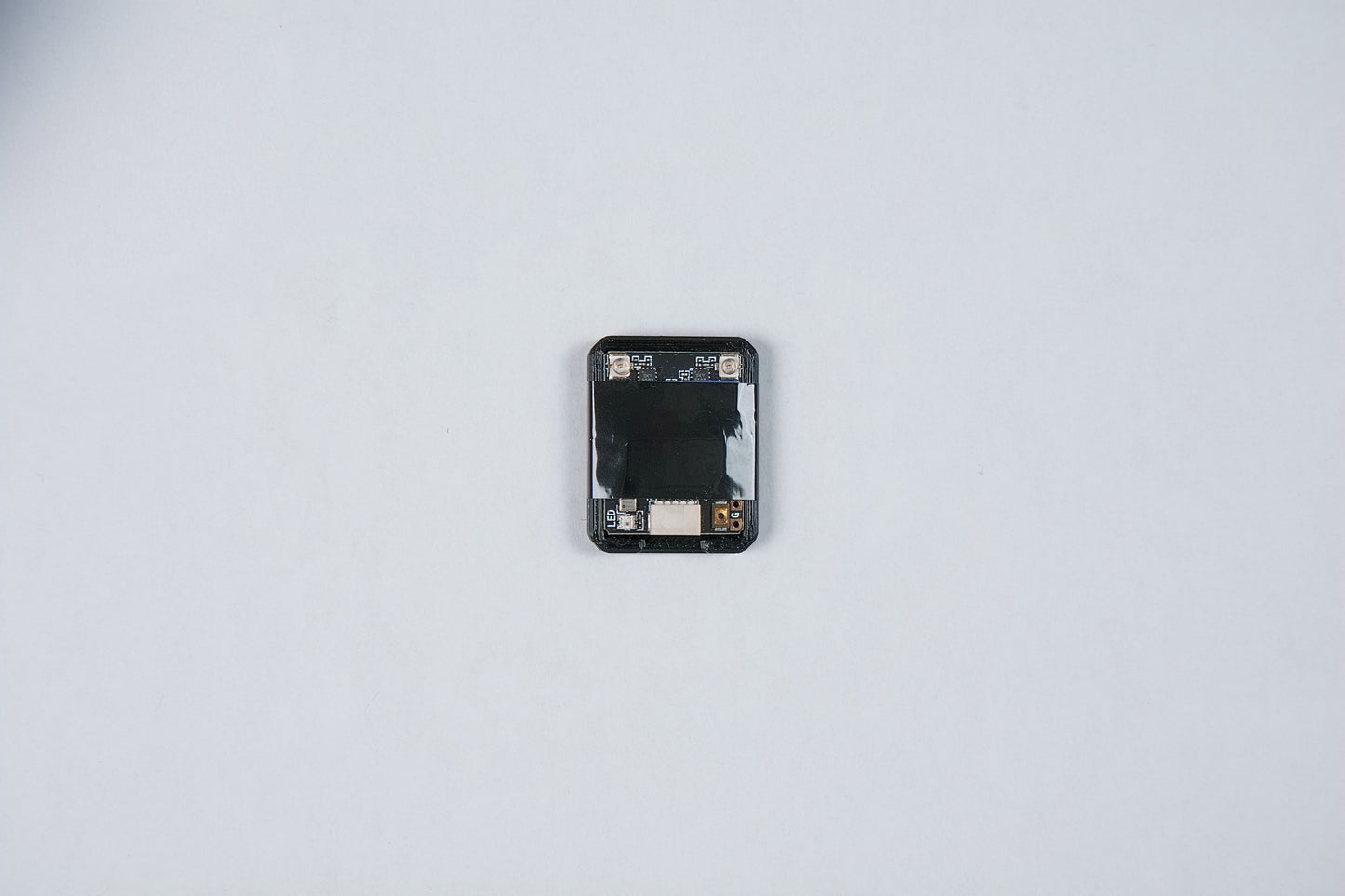 fpv geprc gemeni dual band receiver in a custom 3d print on a white background