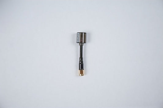 fpv lollipop v5 antenna outside of its packaging on a white background